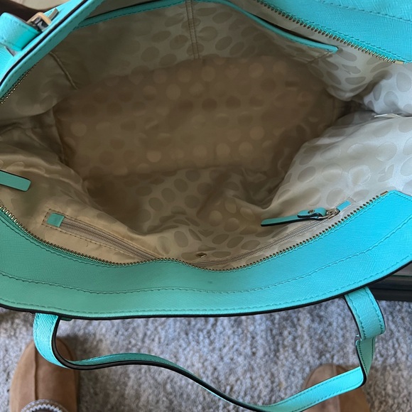 Kate spade tote with inside zipper pocket and two pockets on other side. - Picture 4 of 14